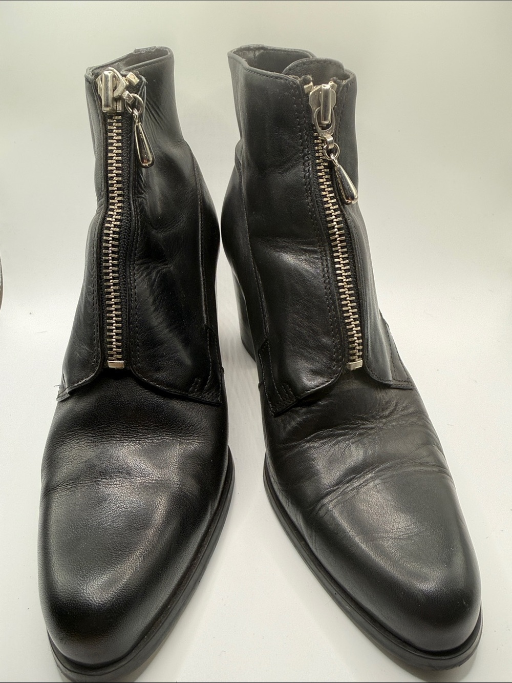 x-appeal Black Leather Front-Zip Ankle Booties with Silver Hardware